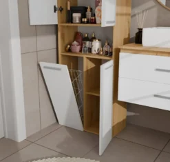Armadio bagno salvaspazio 60x174 cm con cesto portabiancheria bianco e rovere ABT2