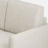Divano 138x85cm design a due posti con pouf stoffa idrorepellente bianco latte DI26